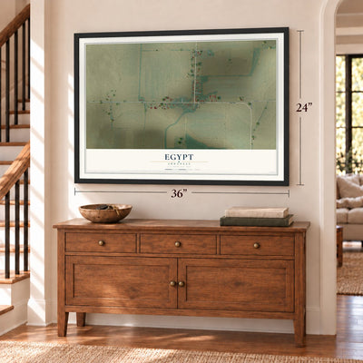 Egypt, Arkansas map, 24 x 36 inch print in a black frame above a dresser by a staircase