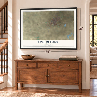 Town of Pecos, Texas map, 24 x 36 inch print in a black frame above a dresser by a staircase