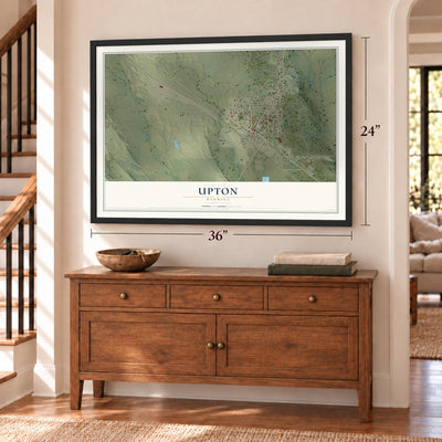 Upton, Wyoming map, 24 x 36 inch print in a black frame above a dresser by a staircase