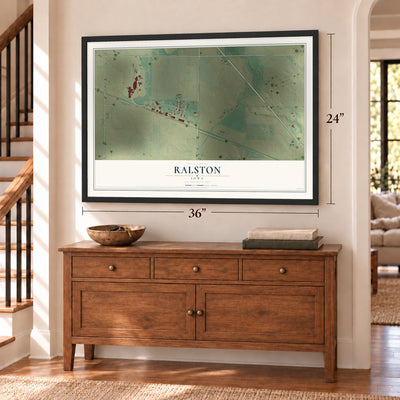 Ralston, Iowa map, 24 x 36 inch print in a black frame above a dresser by a staircase