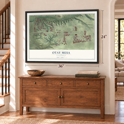 Otay Mesa, California map, 24 x 36 inch print in a black frame above a dresser by a staircase