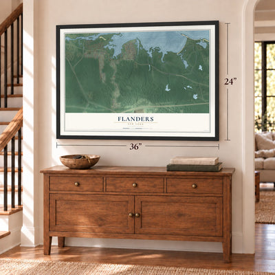 Flanders, New York map, 24 x 36 inch print in a black frame above a dresser by a staircase