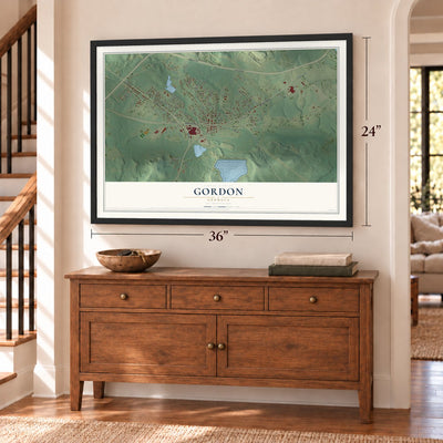 Gordon, Georgia map, 24 x 36 inch print in a black frame above a dresser by a staircase