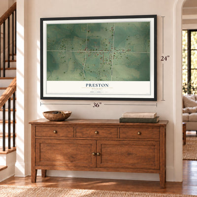 Preston, Missouri map, 24 x 36 inch print in a black frame above a dresser by a staircase
