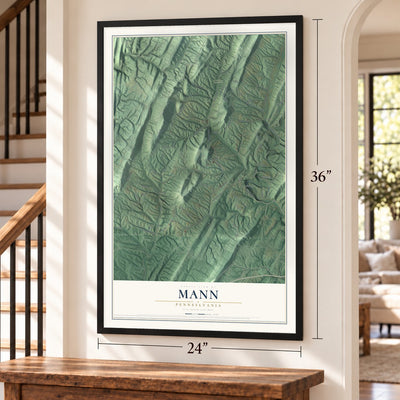 Mann, Pennsylvania map, 24 x 36 inch print in a black frame by a staircase