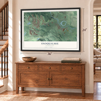 Snoqualmie, Washington map, 24 x 36 inch print in a black frame above a dresser by a staircase