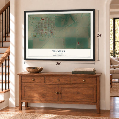Thomas, Oklahoma map, 24 x 36 inch print in a black frame above a dresser by a staircase