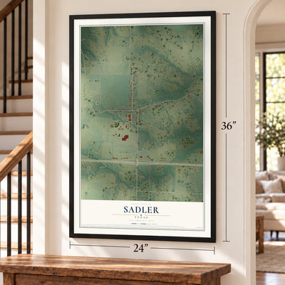 Sadler, Texas map, 24 x 36 inch print in a black frame by a staircase