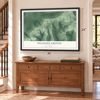 Pleasant Groves, Alabama map, 24 x 36 inch print in a black frame above a dresser by a staircase