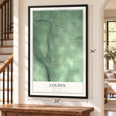 Colden, New York map, 24 x 36 inch print in a black frame by a staircase