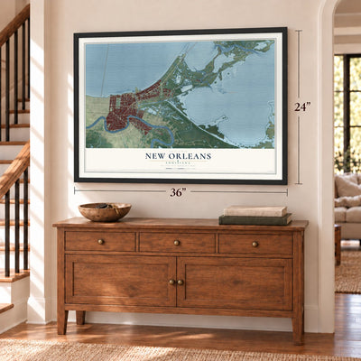 New Orleans, Louisiana map, 24 x 36 inch print in a black frame above a dresser by a staircase