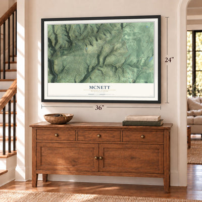McNett, Pennsylvania map, 24 x 36 inch print in a black frame above a dresser by a staircase