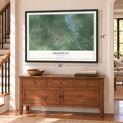 Aberdeen, Mississippi map, 24 x 36 inch print in a black frame above a dresser by a staircase