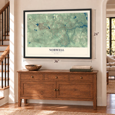 Norwell, Massachusetts map, 24 x 36 inch print in a black frame above a dresser by a staircase