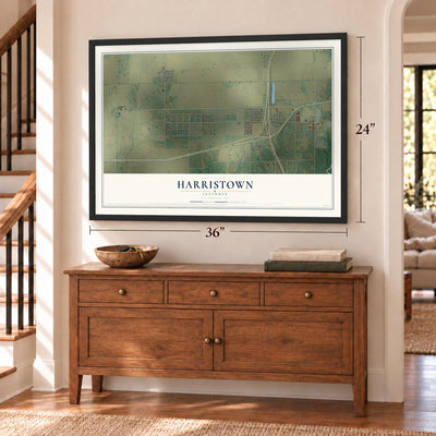 Harristown, Illinois map, 24 x 36 inch print in a black frame above a dresser by a staircase
