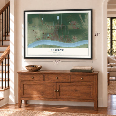 Reserve, Louisiana map, 24 x 36 inch print in a black frame above a dresser by a staircase
