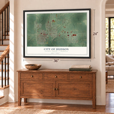 Hudson, Michigan map, 24 x 36 inch print in a black frame above a dresser by a staircase