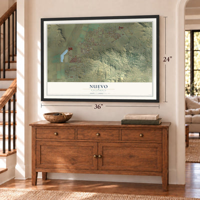 Nuevo, California map, 24 x 36 inch print in a black frame above a dresser by a staircase