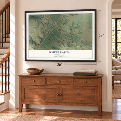 White Earth, North Dakota map, 24 x 36 inch print in a black frame above a dresser by a staircase