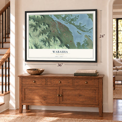 Wabasha, Minnesota map, 24 x 36 inch print in a black frame above a dresser by a staircase