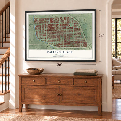 Valley Village, California map, 24 x 36 inch print in a black frame above a dresser by a staircase