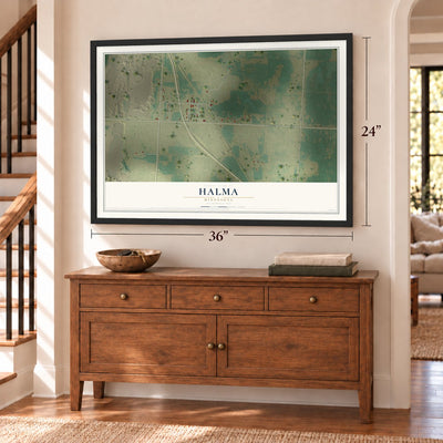 Halma, Minnesota map, 24 x 36 inch print in a black frame above a dresser by a staircase