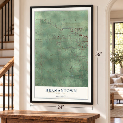 Hermantown, Minnesota map, 24 x 36 inch print in a black frame by a staircase
