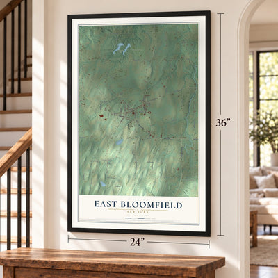 East Bloomfield, New York map, 24 x 36 inch print in a black frame by a staircase