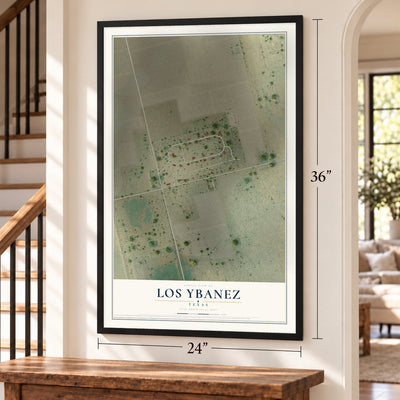 Los Ybanez, Texas map, 24 x 36 inch print in a black frame by a staircase