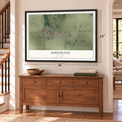 Nerstrand, Minnesota map, 24 x 36 inch print in a black frame above a dresser by a staircase