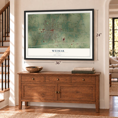 Weimar, Texas map, 24 x 36 inch print in a black frame above a dresser by a staircase