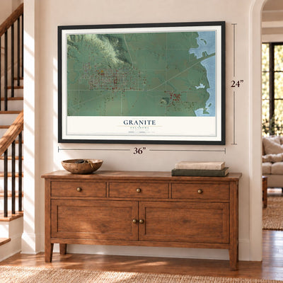 Granite, Oklahoma map, 24 x 36 inch print in a black frame above a dresser by a staircase