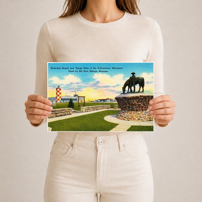 Billings, MT: Municipal Airport and "Range of the Yellowstone" Monument, posed by Bill Hart