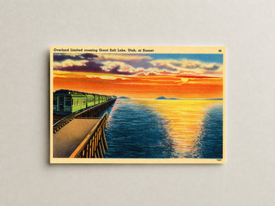 Great Salt Lake, UT: Overland Limited crossing Great Salt Lake, Utah, at sunset