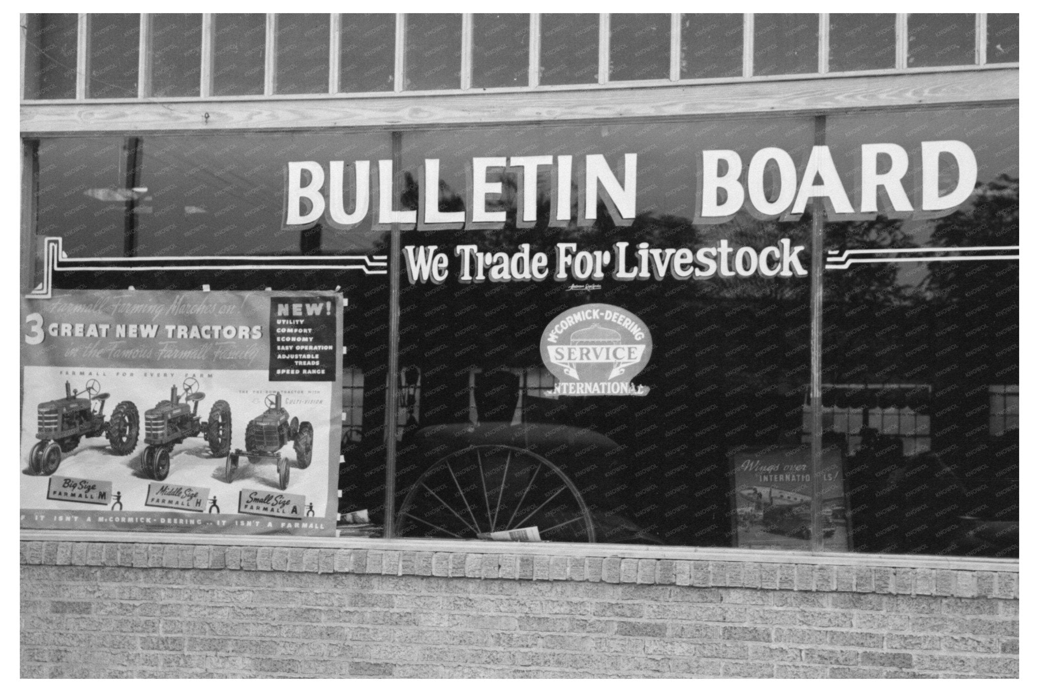 Agricultural Machinery Store Window Brownwood Texas 1939 - Available at KNOWOL