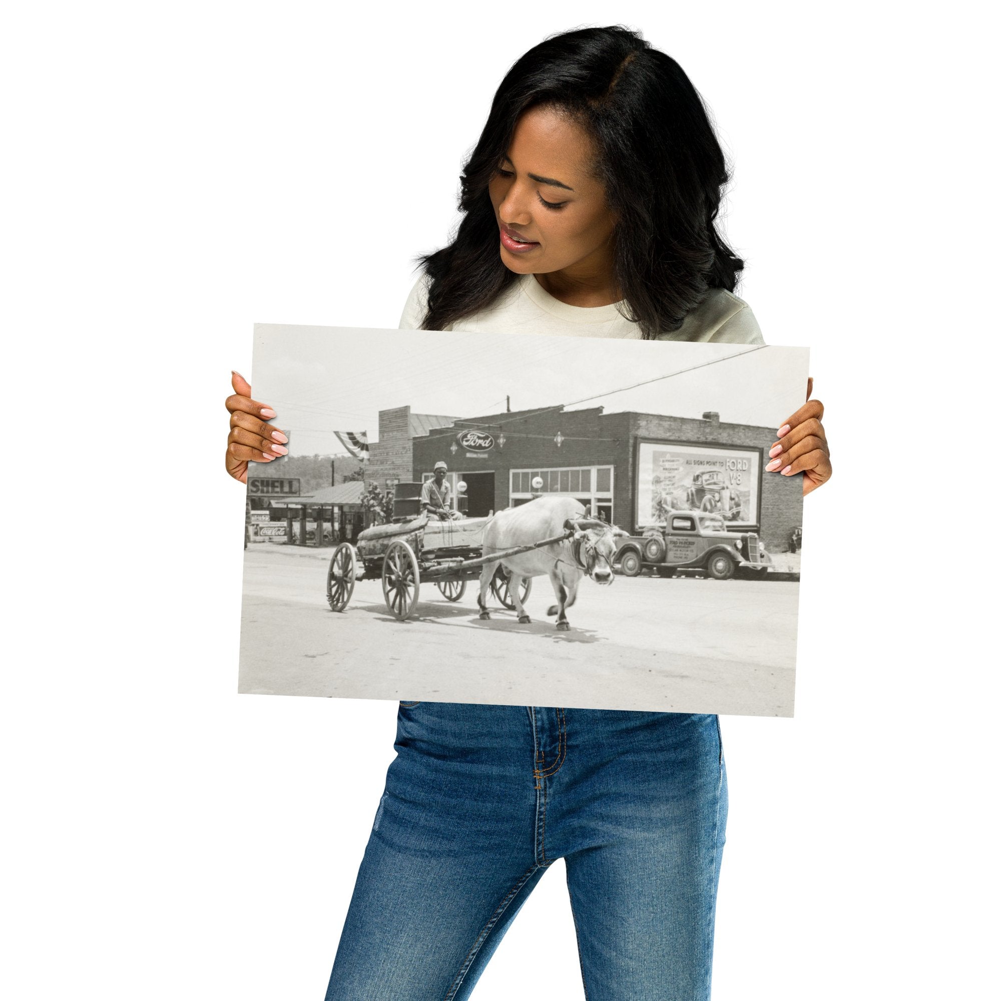 AL - Young Man rides Ox Drawn Cart past a Ford Dealer and Shell Gas Station. Eden, Alabama 1936 - Available at KNOWOL