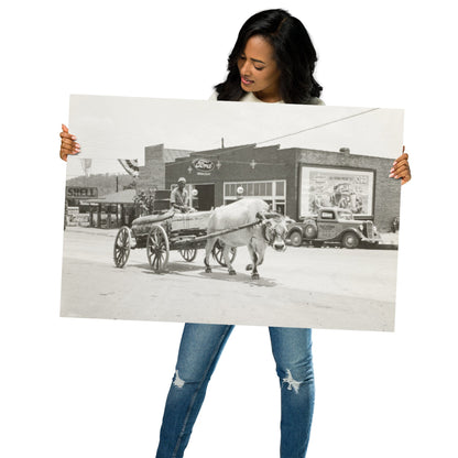 AL - Young Man rides Ox Drawn Cart past a Ford Dealer and Shell Gas Station. Eden, Alabama 1936 - Available at KNOWOL