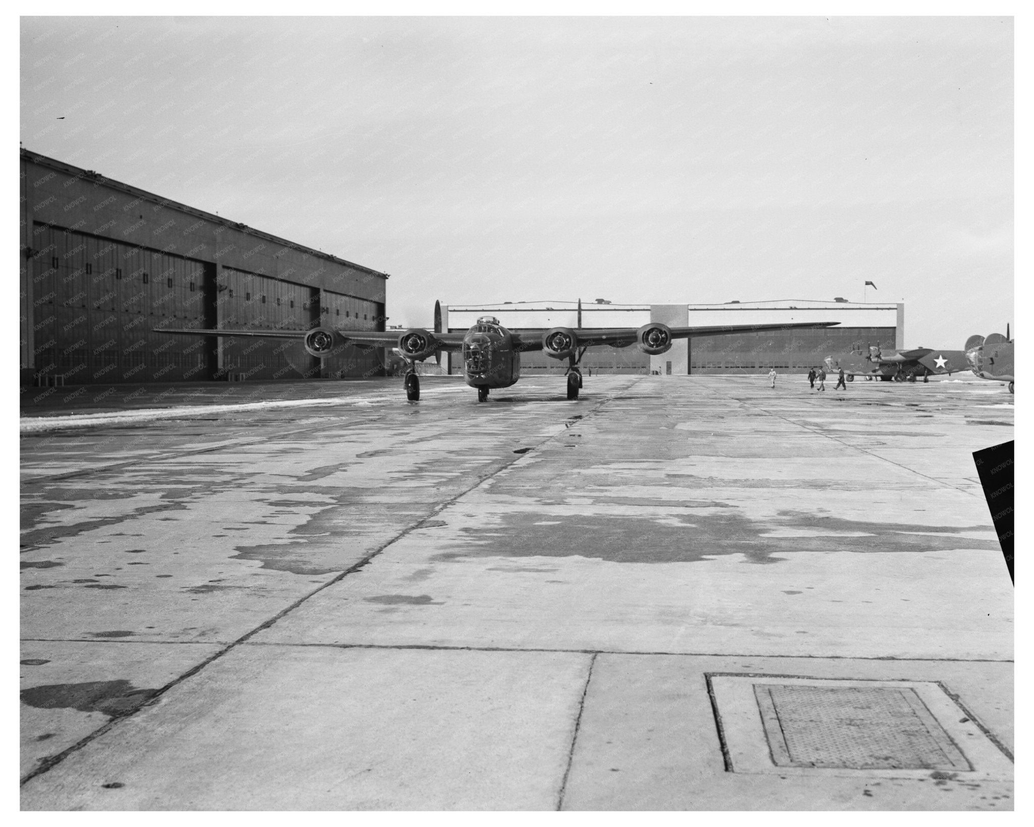 B - 24E Liberator Bomber Taxis at Willow Run 1944 - Available at KNOWOL