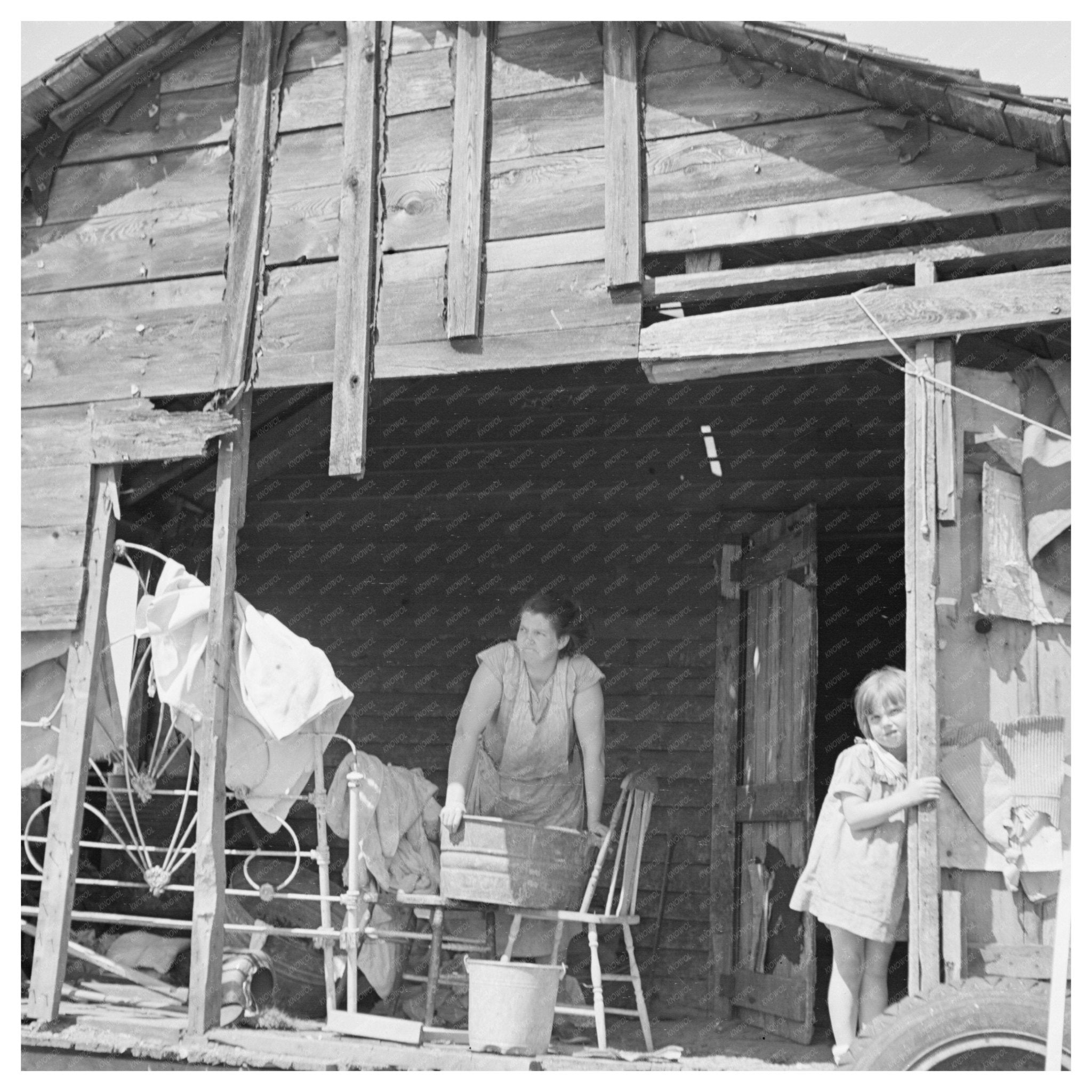 Back Porch Washday Scene Gibbs City Michigan 1937 - Available at KNOWOL