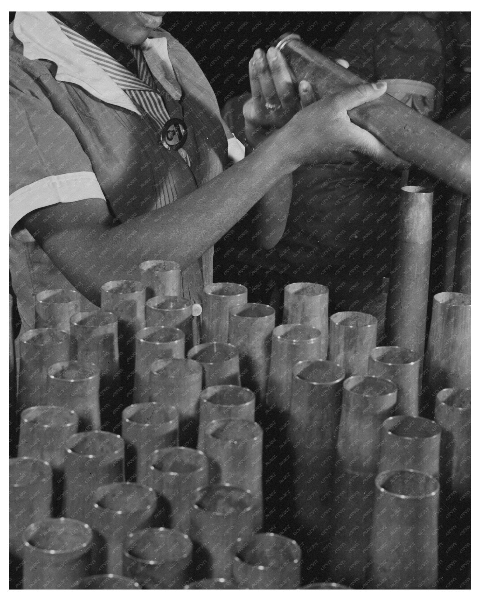 Bertha Stallworth Inspects Artillery Cartridge 1943 - Available at KNOWOL