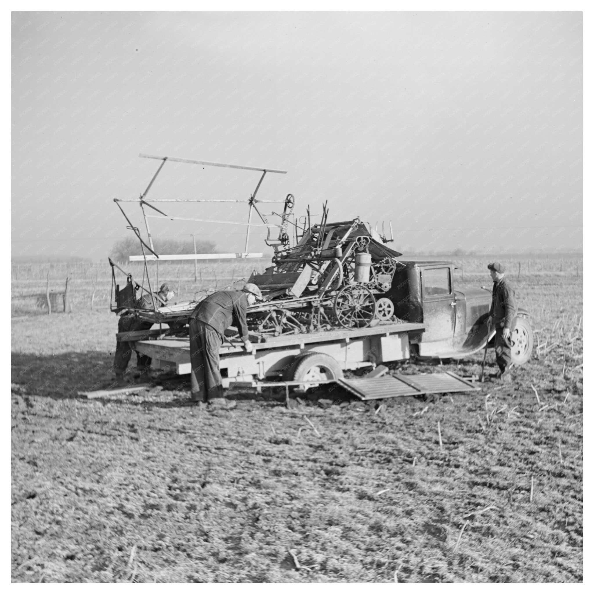 Binder Loading on Truck for Transport March 1937 - Available at KNOWOL