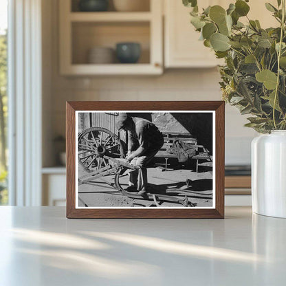 Blacksmith Helper Disassembling Plow February 1940 - Available at KNOWOL