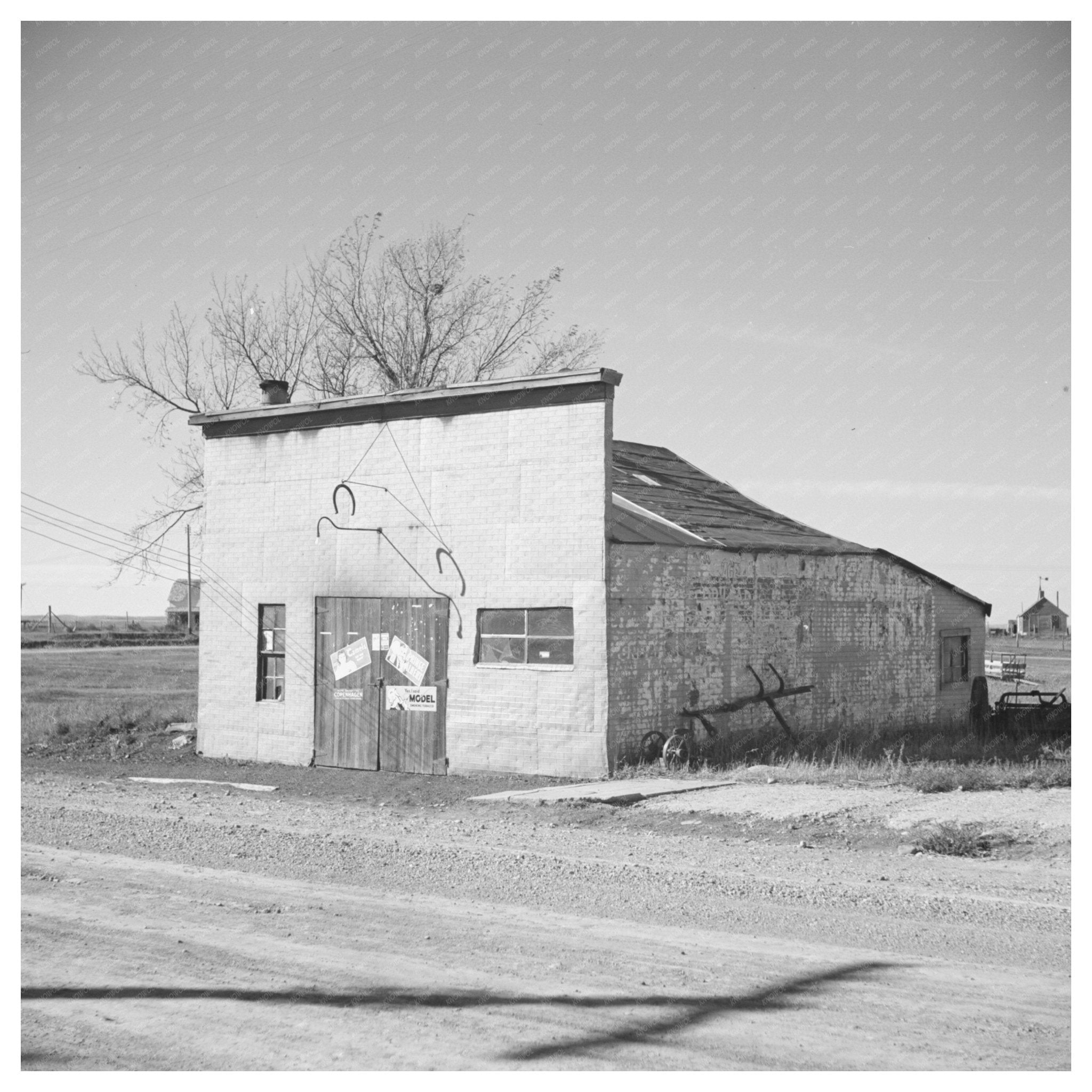 Blacksmith Shop in Des Lacs North Dakota 1937 - Available at KNOWOL