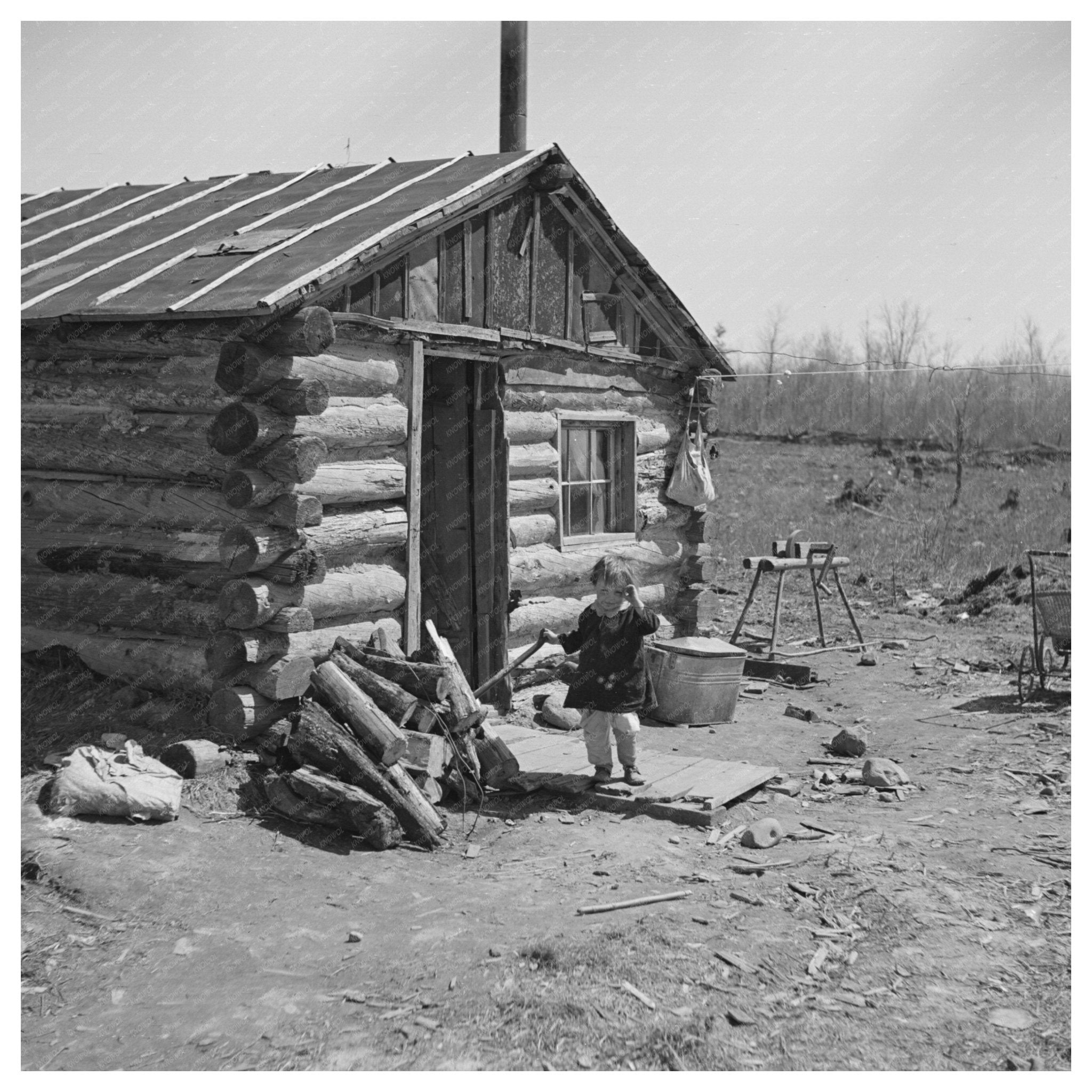 Bodray Child in Front of Family Home Tipler Wisconsin 1937 - Available at KNOWOL