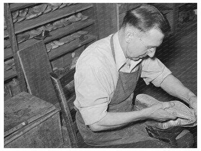 Bootmaker Fitting Last and Sole in Alpine Texas 1939 - Available at KNOWOL