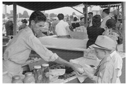 Boy Buying Hamburger at Louisiana State Fair 1938 - Available at KNOWOL