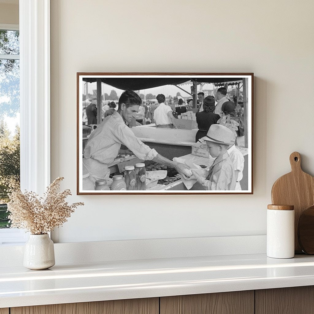 Boy Buying Hamburger at Louisiana State Fair 1938 - Available at KNOWOL