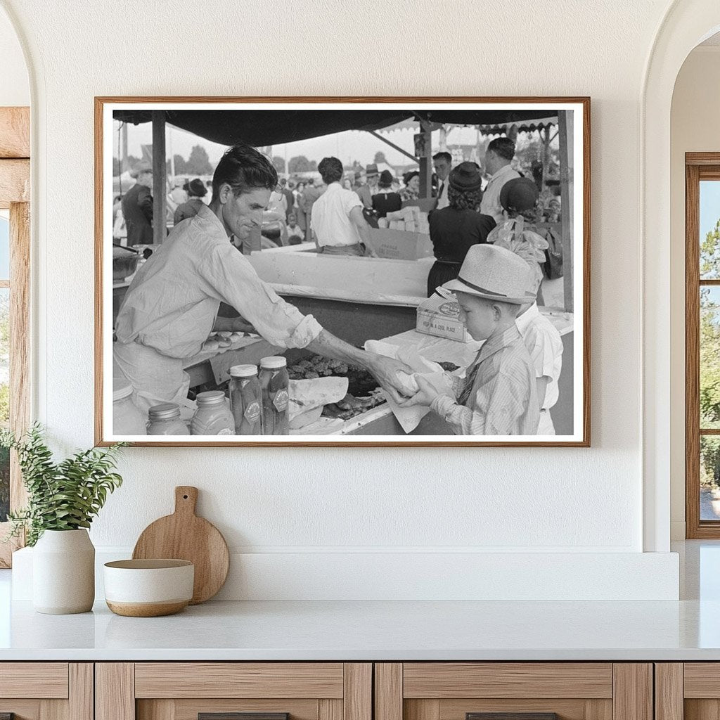 Boy Buying Hamburger at Louisiana State Fair 1938 - Available at KNOWOL