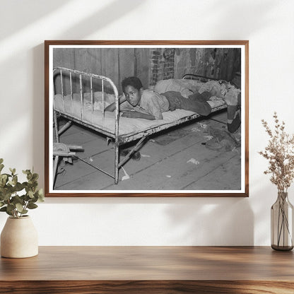 Boy Resting in Attic of Sharecropper Shack May 1938 - Available at KNOWOL
