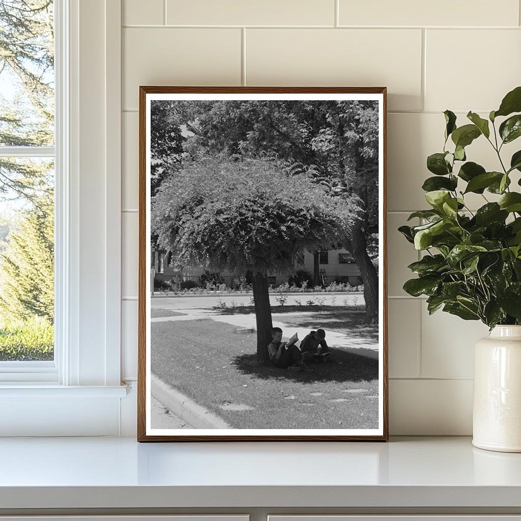 Boys Reading Outdoors in Caldwell Idaho July 1941 - Available at KNOWOL